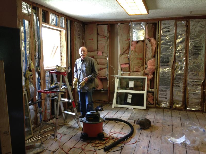 Remote viewing training center under construction with insulation and framing in progress.
